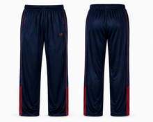 Load image into Gallery viewer, A pair of navy blue athletic track pants shown from both the front and back views. The pants feature red side stripes running down the legs and red panels at the lower hem, with a small red logo on the front left thigh.