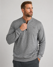 Load image into Gallery viewer, A man wearing a heather gray long-sleeve quarter-zip pullover sweater, shown from the waist up against a light gray studio background.