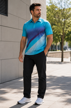 Load image into Gallery viewer, A man wearing a short-sleeve athletic polo shirt with a blue, purple, and white gradient pattern, paired with black pants and white sneakers, standing outdoors next to a modern building.
