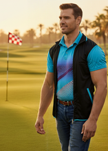 Load image into Gallery viewer, Man in a blue shirt and black vest on a golf course with palm trees in the background
